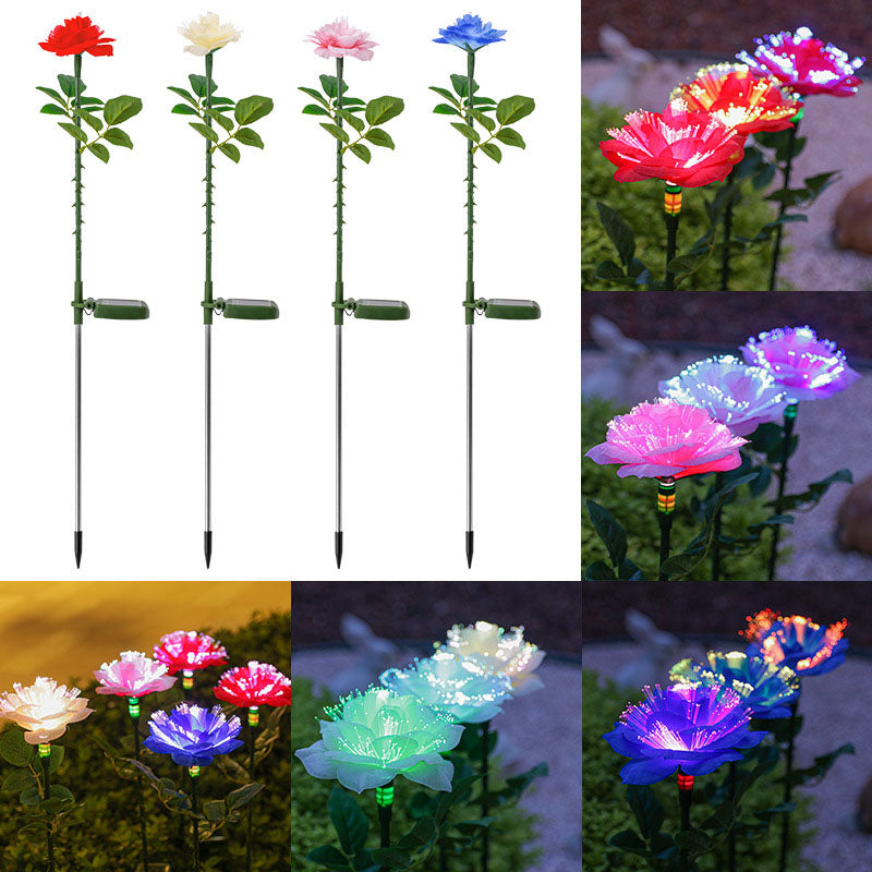 Solcellsdriven trädgårdsbelysning med blomma, påle och färgglatt LED-sken