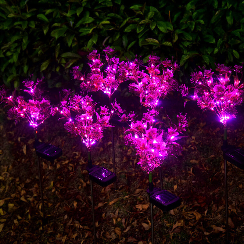 Solcelledrevet lilla blomsterbedslampe på spyd med LED-lys