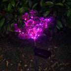 Solcelledrevet lilla blomsterbedslampe på spyd med LED-lys