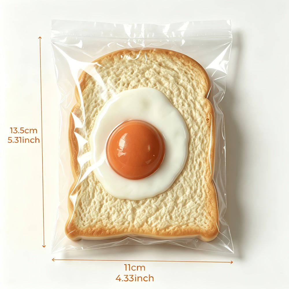 Stressleksak som kläms ihop, rostat bröd med stekt ägg