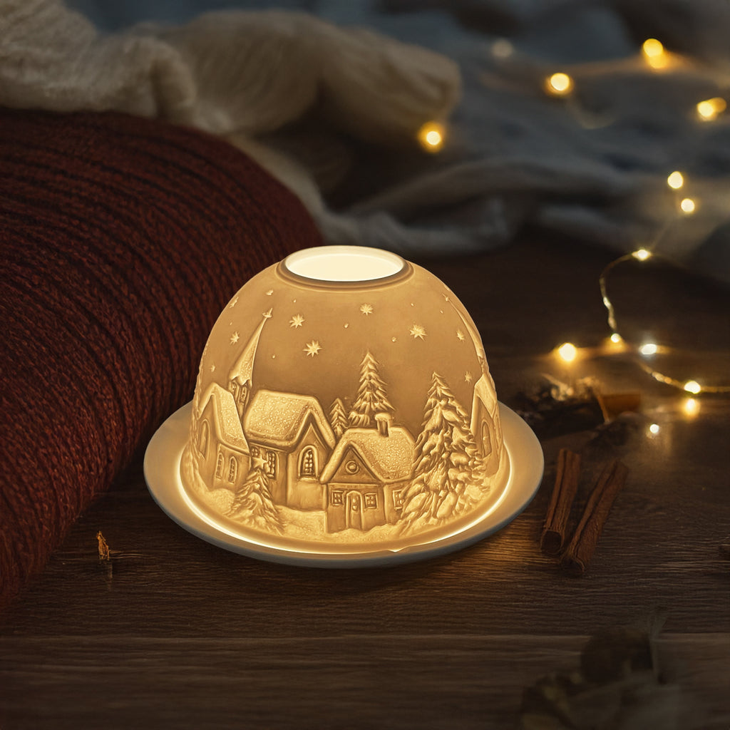 Portavelas luminoso de pueblo navideño