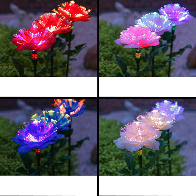 Solcellsdriven trädgårdsbelysning med blomma, påle och färgglatt LED-sken