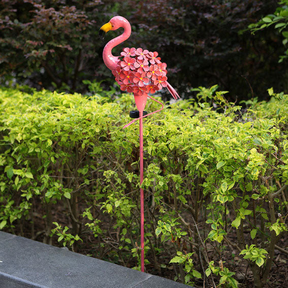 Solcelledrevet flamingolampe på spyd til haven med varmt LED-lys