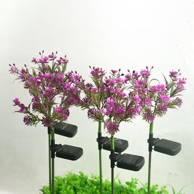 Solcelledrevet lilla blomsterbedslampe på spyd med LED-lys