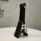 Soporte para púas con forma de guitarra