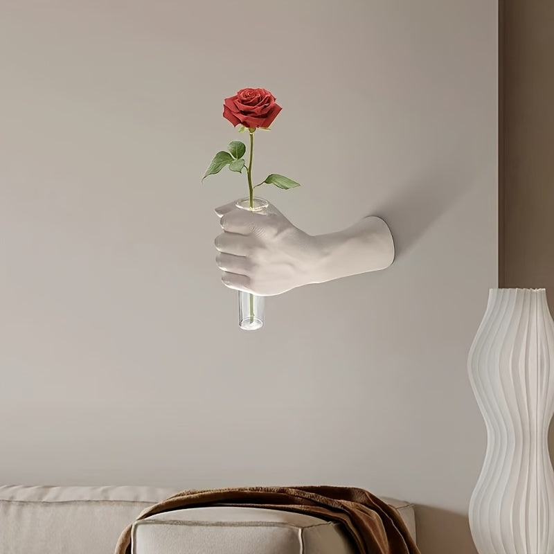 Jarrón de pared con forma de mano para flores