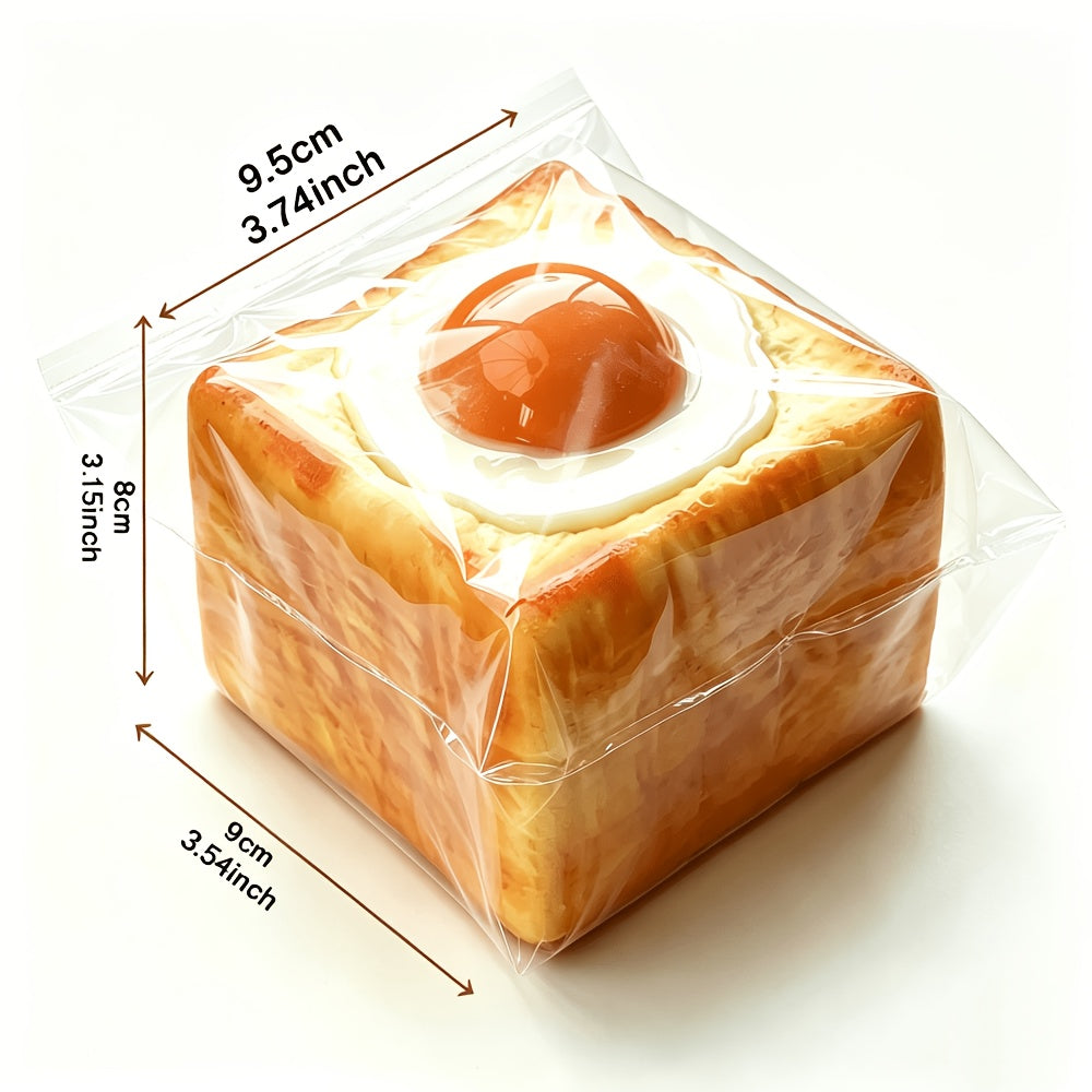 Jouet antistress à presser en forme de toast avec œuf au plat