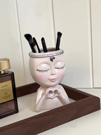 Organizador de brochas de maquillaje con forma de rostro