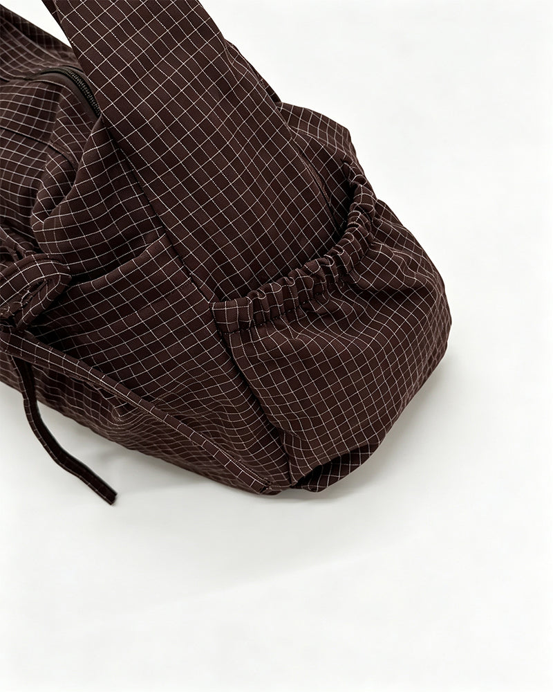 Borsa a spalla da donna a motivo check con più tasche