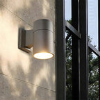 Lampada da parete cilindrica moderna a LED per esterni con luce rivolta verso l'alto e verso il basso