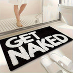 Badrumsmatta med texten "Get Naked"
