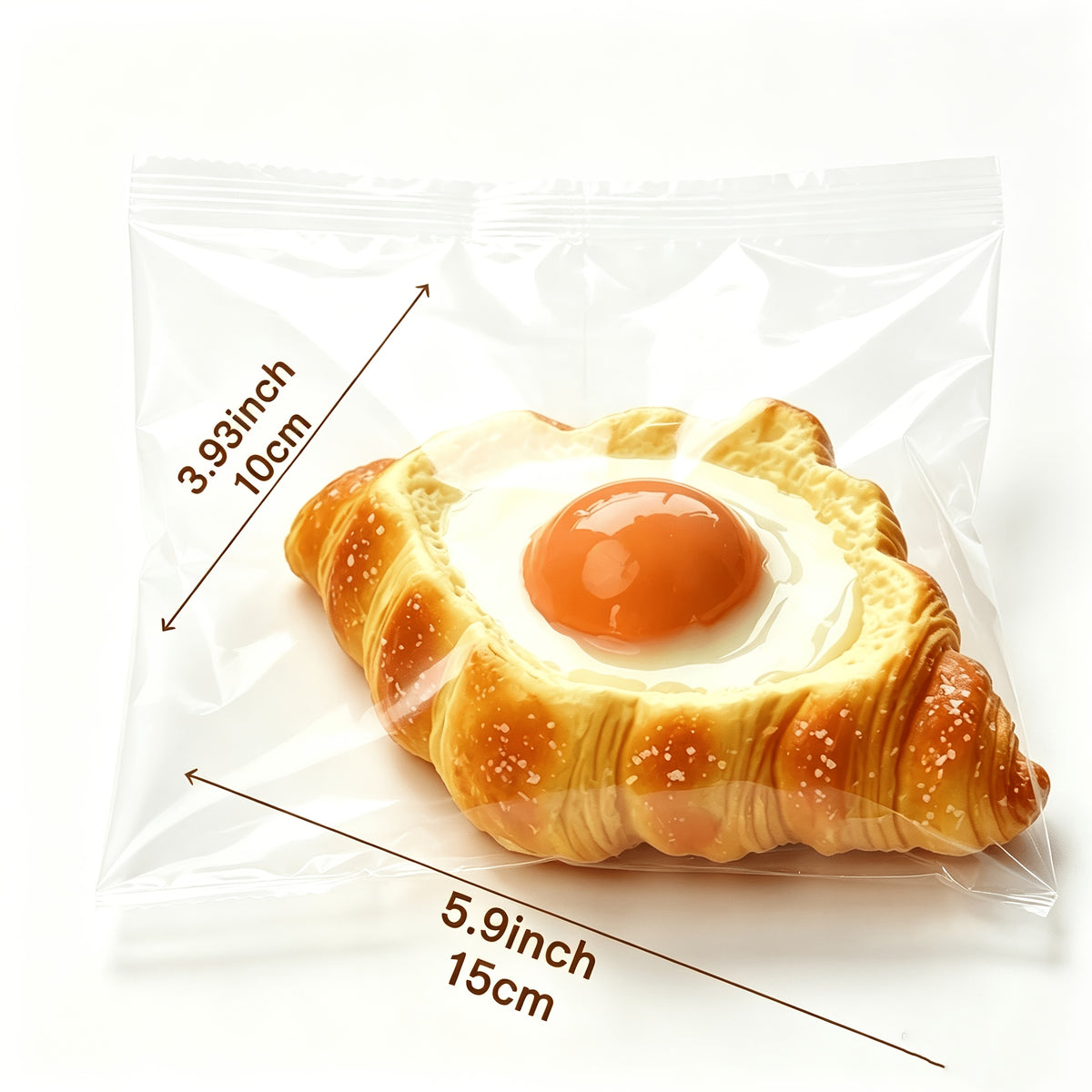 Stressleksak som kläms ihop, rostat bröd med stekt ägg