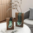 Jarrones decorativos de madera con insertos de vidrio esculpido