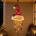 Festliche Weihnachtsbeleuchtung zum Aufhängen in Form einer Weihnachtsmannmütze mit Stern- und Baumornamenten