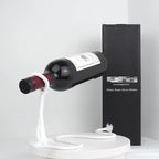 Soporte para botella con cuerda de equilibrio