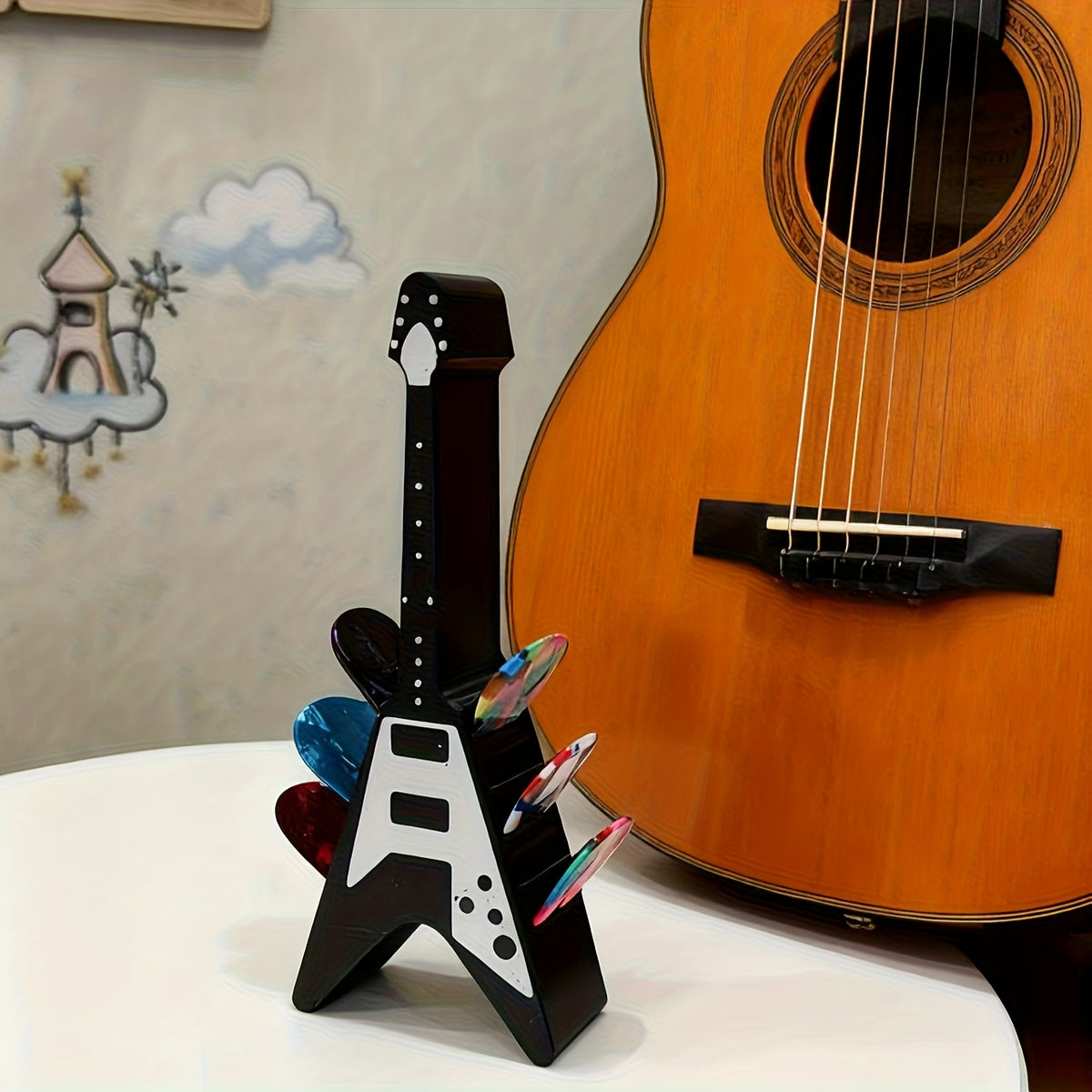 Soporte para púas con forma de guitarra