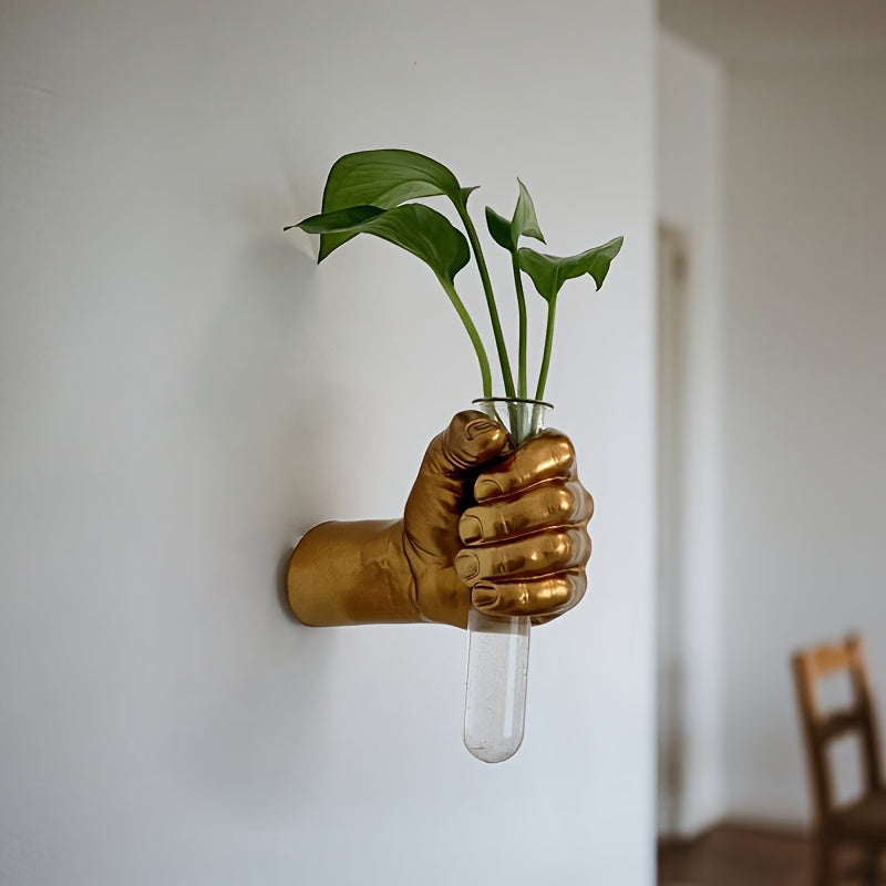Jarrón de pared con forma de mano para flores