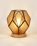 Geometryczna lampka stołowa z bursztynowego szkła