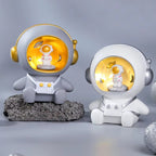 Sparegris med astronautmotiv og LED-natlys