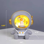 Sparegris med astronautmotiv og LED-natlys