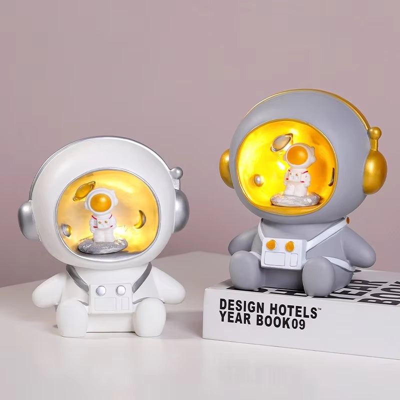 Sparegris med astronautmotiv og LED-natlys