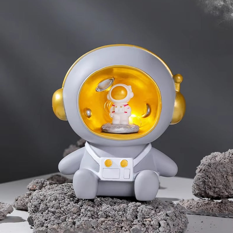 Sparegris med astronautmotiv og LED-natlys