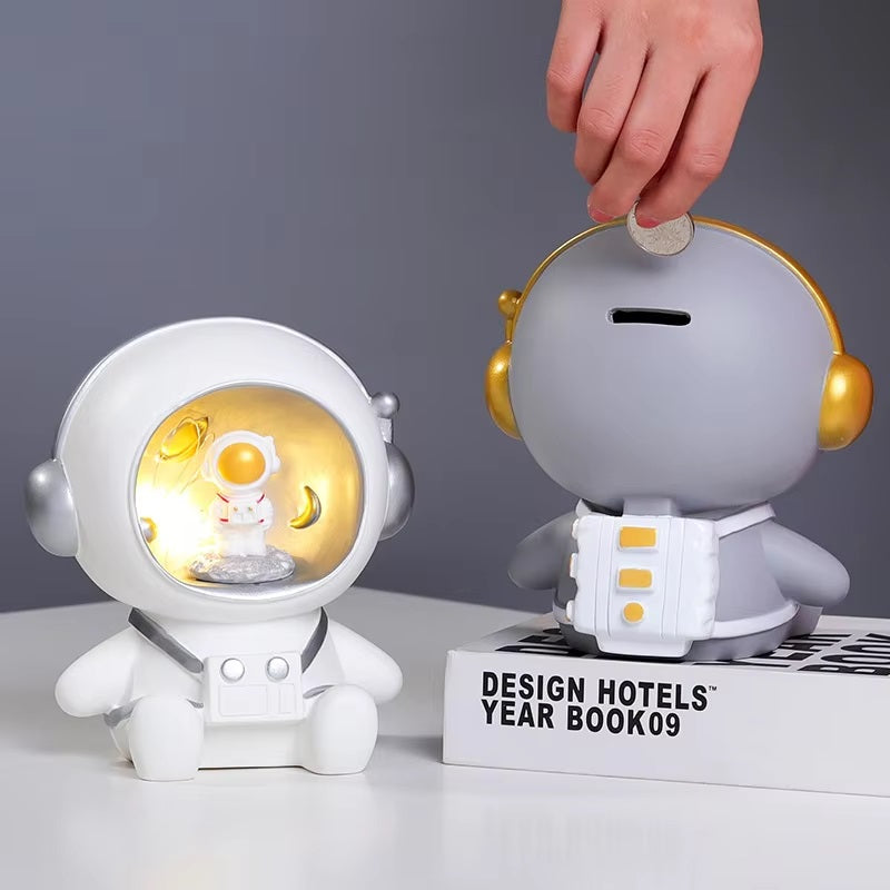 Sparegris med astronautmotiv og LED-natlys