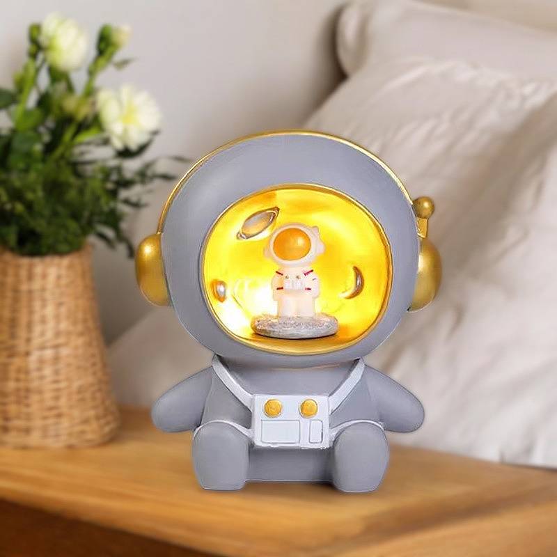 Sparegris med astronautmotiv og LED-natlys