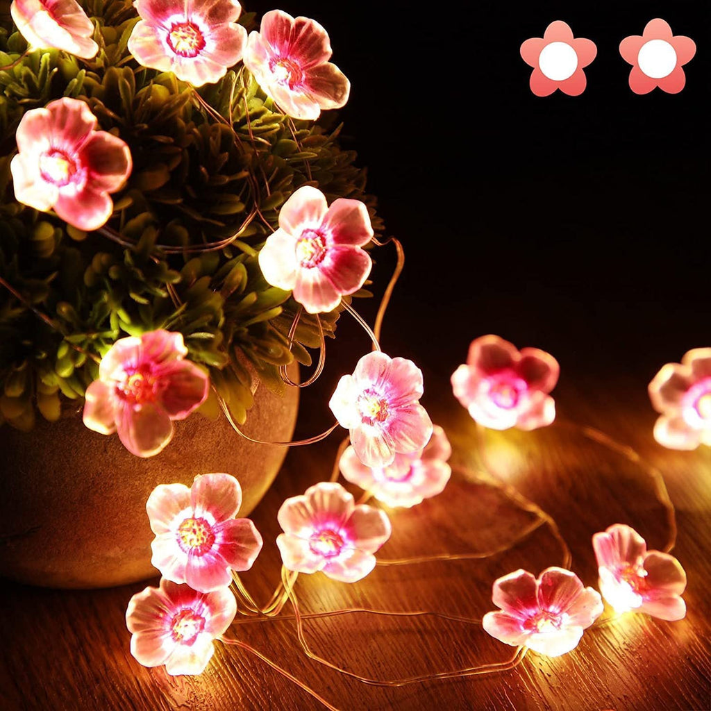 Dekorativ LED-lyskæde med lyserøde blomster