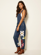 Dame denim-overalls med blomsterbroderi og justerbare skulderstropper  