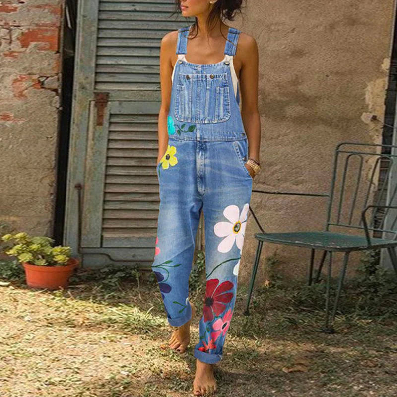Dame denim-overalls med blomsterbroderi og justerbare skulderstropper  