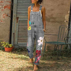 Dame denim-overalls med blomsterbroderi og justerbare skulderstropper  