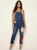 Dame denim-overalls med blomsterbroderi og justerbare skulderstropper  