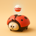 Jouet sensoriel lumineux en forme de coccinelle