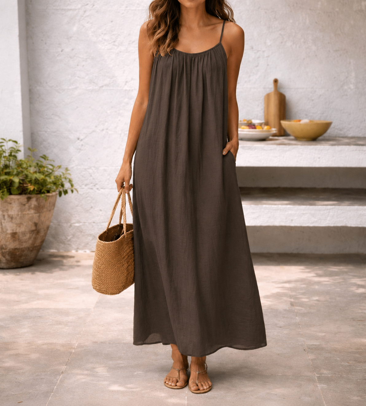 Robe maxi sans manches à bretelles spaghetti avec poches latérales pour femme
