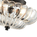 Halvplan loftlampe i glas med kronbladsdesign