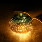 Adorno de calabaza de cristal iluminado