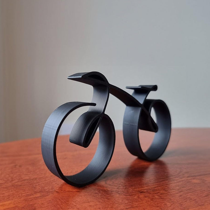 Minimalistisk cykelskulptur til dekorativ udstilling