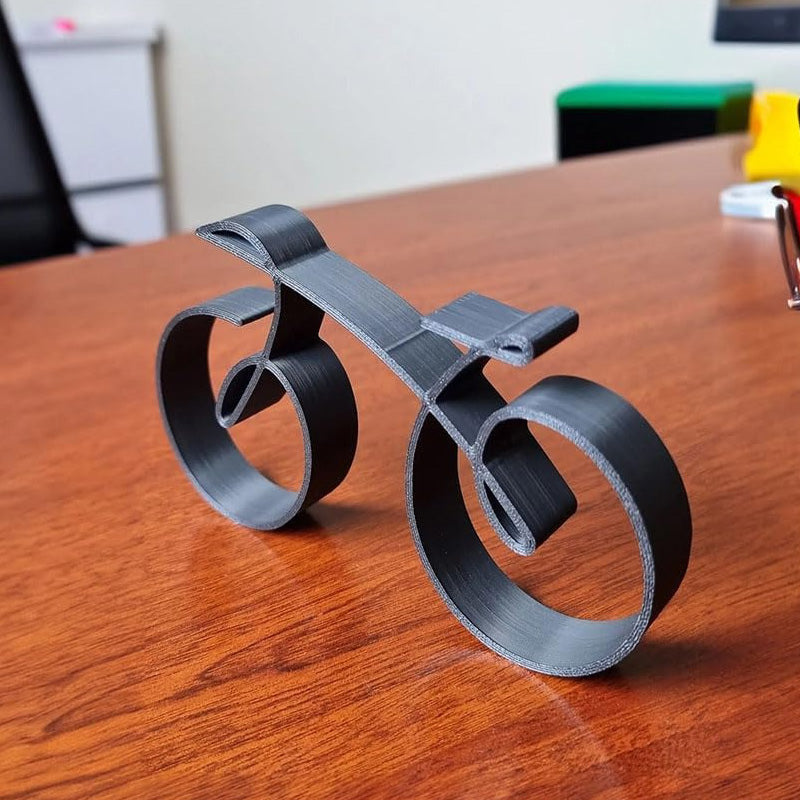Minimalistisk cykelskulptur til dekorativ udstilling
