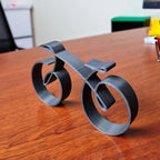 Minimalistisk cykelskulptur til dekorativ udstilling
