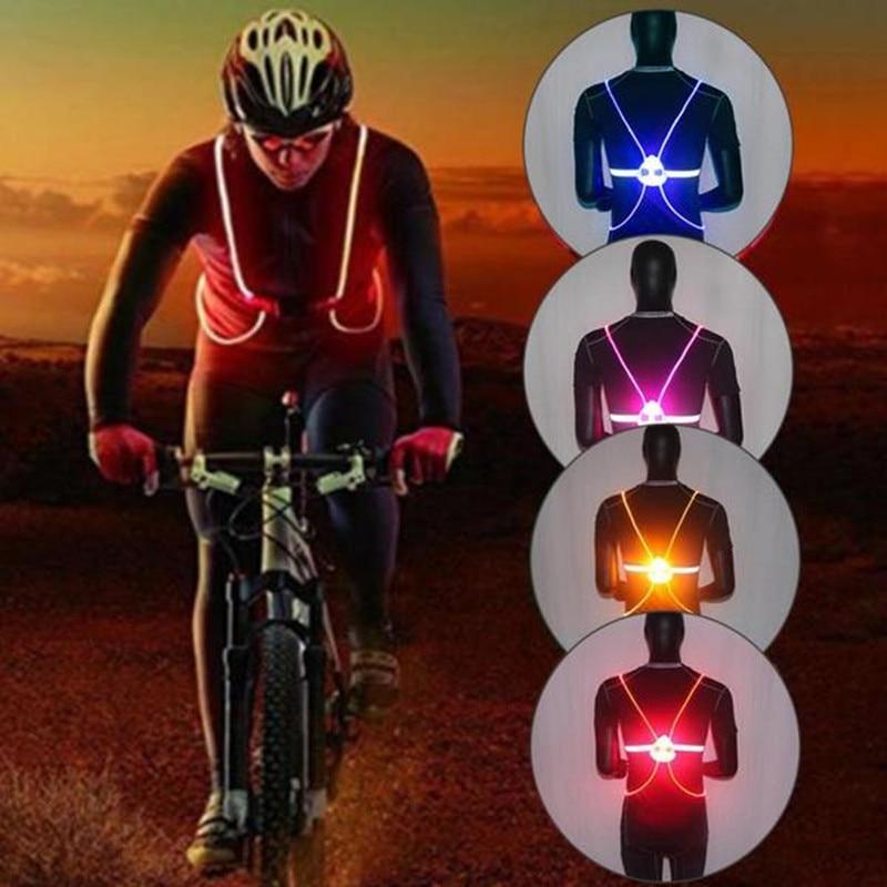 LED-valoilla varustettu huomiovärinen juoksuliivi, säädettävät heijastinnauhat