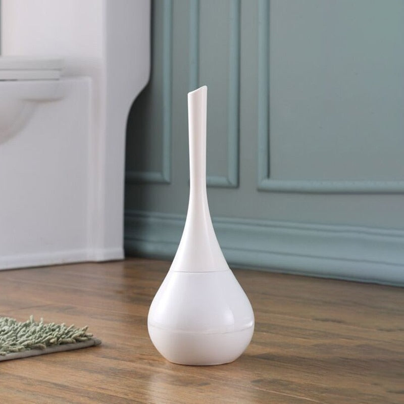 Modern toalettborste med hygieniskt avrundat hållare
