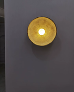 Applique murale en résine texturée au design concentrique avec douce lueur d’ambiance