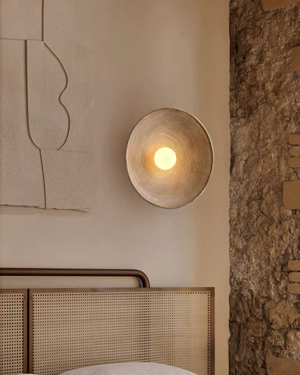 Applique murale en résine texturée au design concentrique avec douce lueur d’ambiance