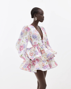 Damen gestuftes Minikleid mit Blumenmuster und voluminösem Peplum-Saum  