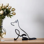 Minimalistisk metalskulptur med corgi-silhuet til moderne boligindretning