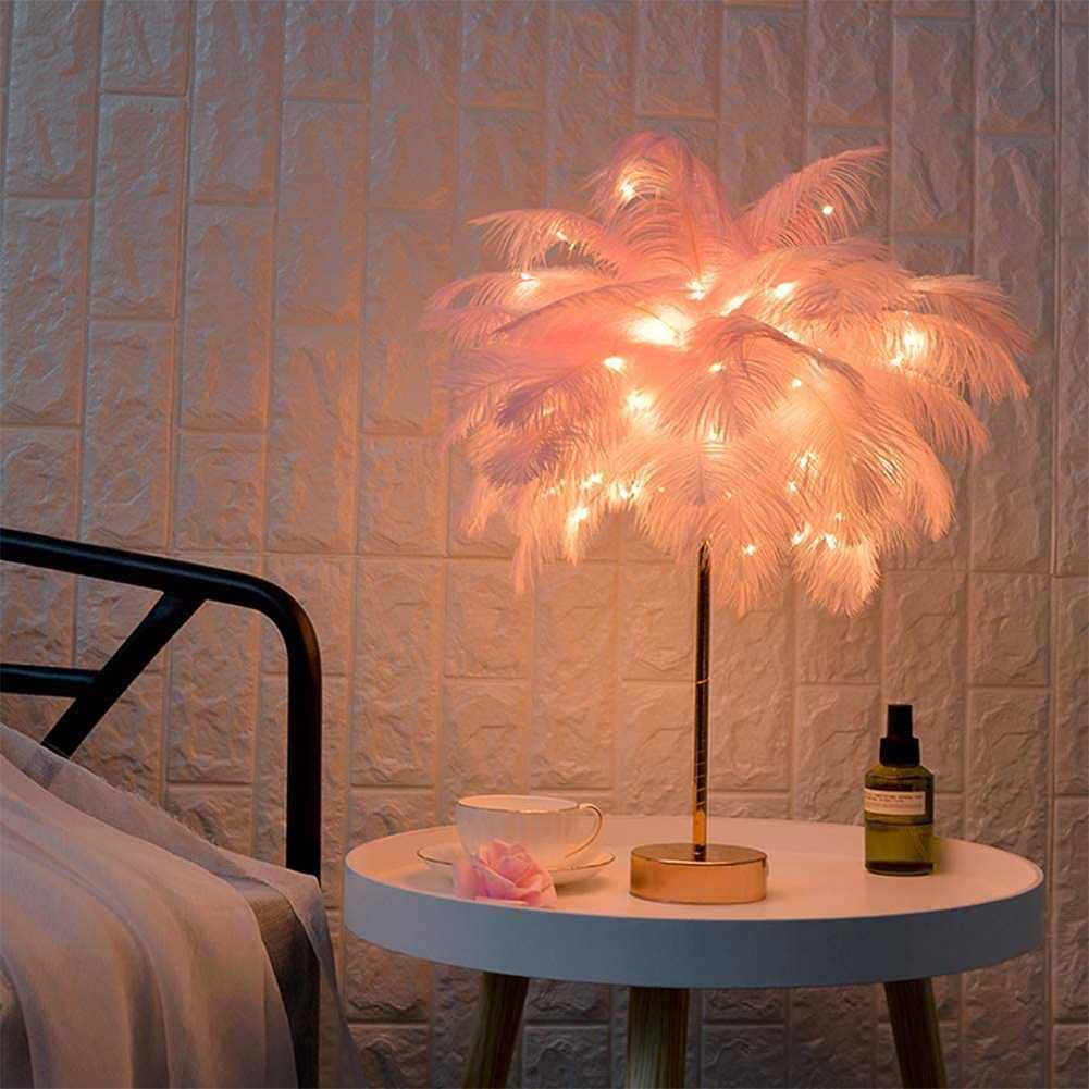 Lampada da tavolo LED con piume di struzzo