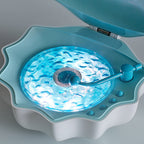 LED-natlampe formet som en muslingeskal med Bluetooth-højttaler