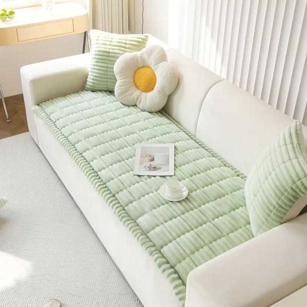 Housse de canapé matelassée avec surpiqûres texturées et bords plissés pour meubles