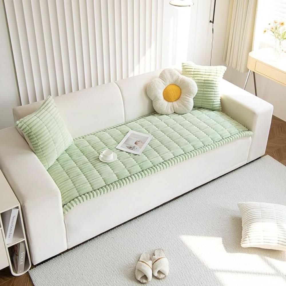 Housse de canapé matelassée avec surpiqûres texturées et bords plissés pour meubles
